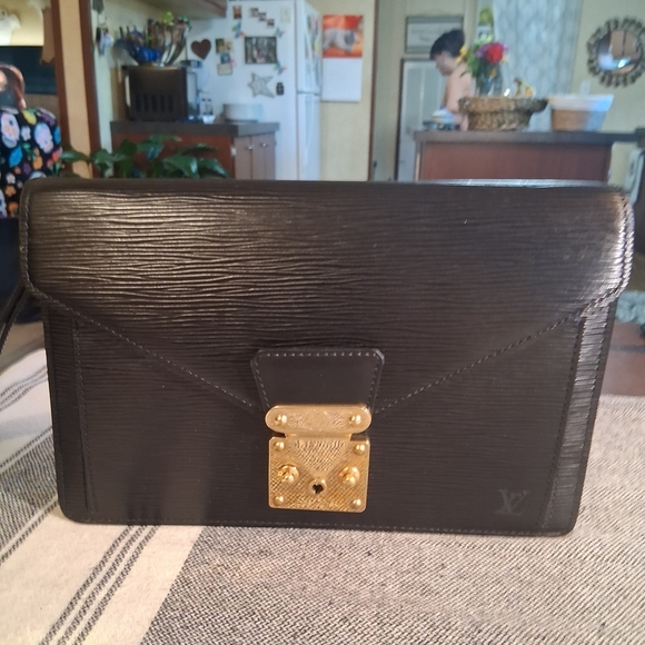 Louis Vuitton Handbags - Louis Vuitton Black Clutch with Gold Hardware